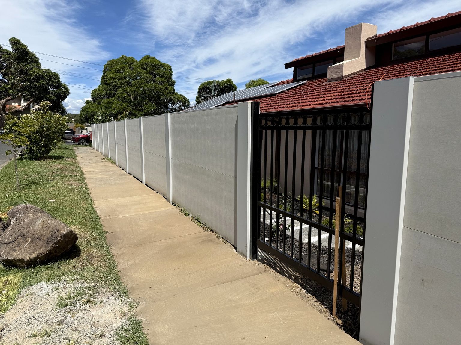 An EstateWall modular boundary along a footpath at Camberwell. A modular wall project, not an acoustic wall.
