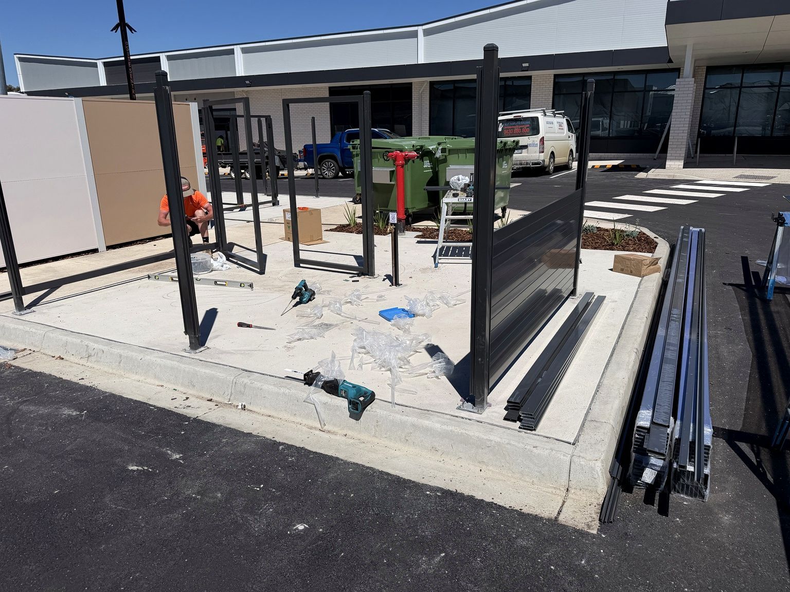 Craigieburn childcare project: SlimWall with slimwall painted to the project colour schedule, aluminium blade fencing, child-safe internal entry and muster-point gates. Photo 4 of 6.