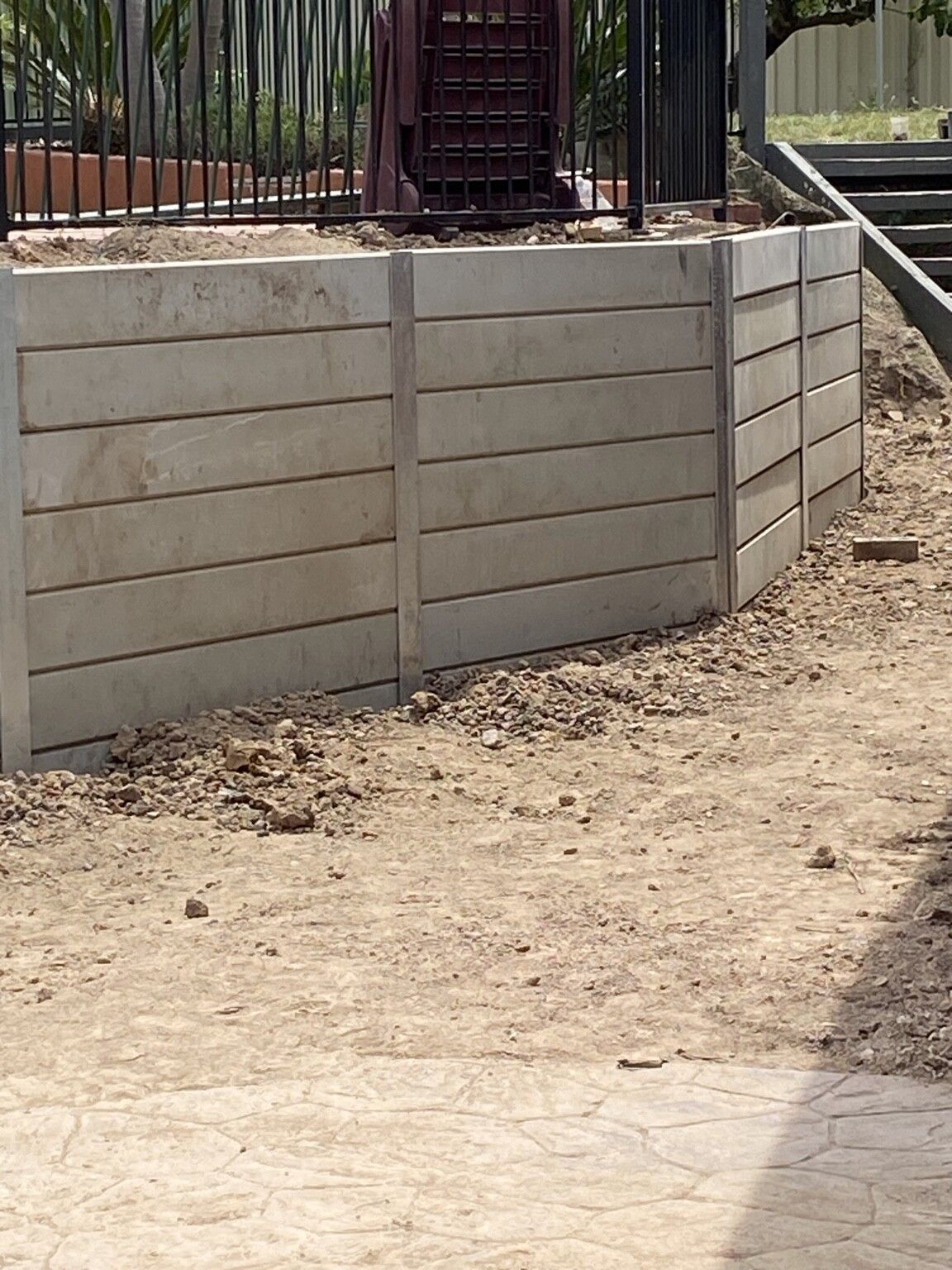 Endeavour Hills project: Concrete sleeper retaining wall with concrete sleepers, steel posts made to suit, access through the garage only. Photo 5 of 6.